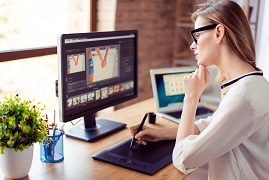 woman using photo editing software